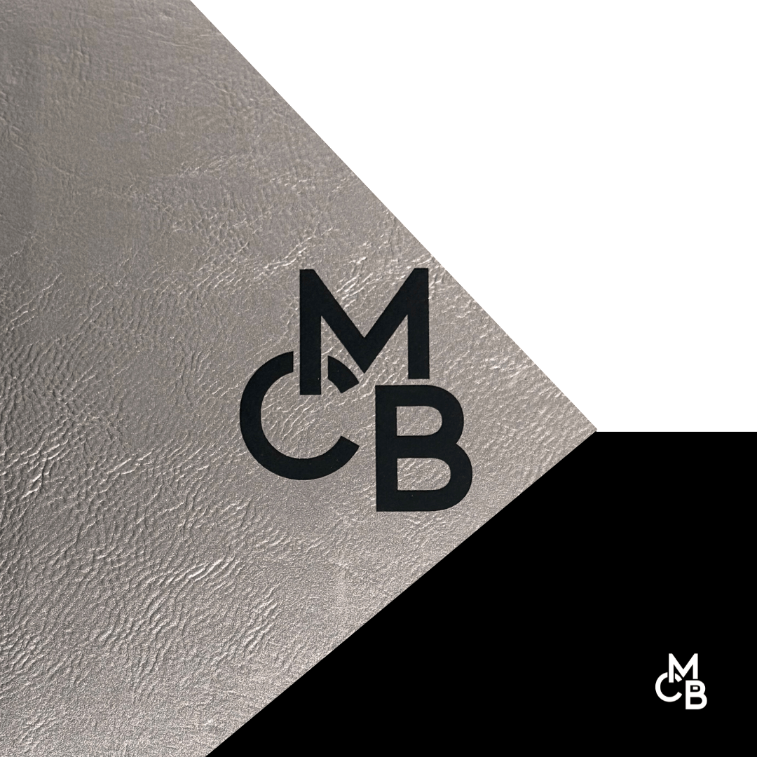 Legacy Leatherette | METALLIC SILVER ENGRAVES BLACK LEATHERETTE SHEETS - LASERABLE LEATHERETTE